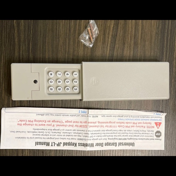 Grey wireless keypad garage doors new in box - Picture 2 of 3